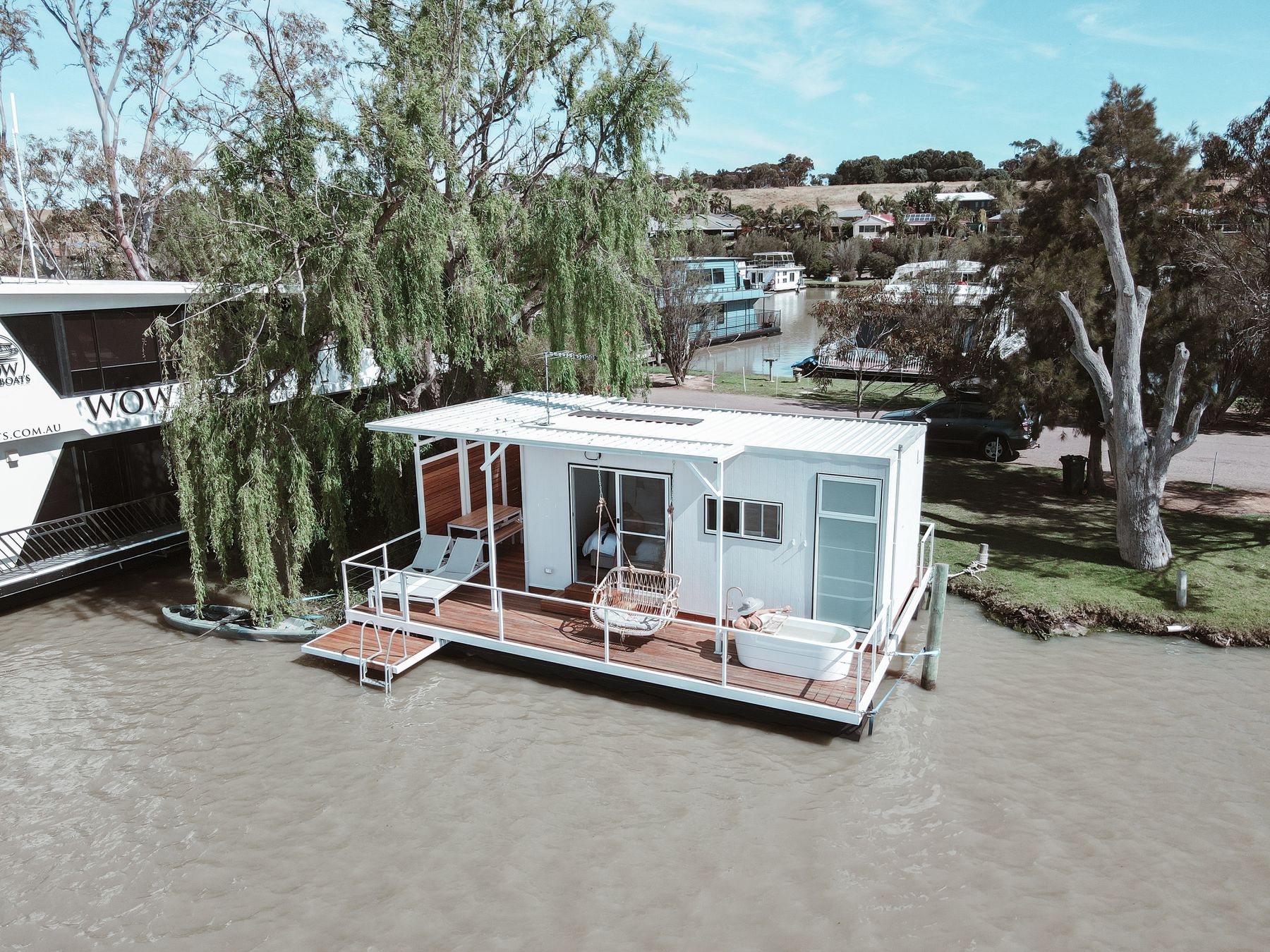Aerial photograph of a houseboat on the river